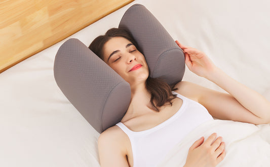 young woman listening to music and relaxing with her Soli pillow